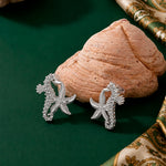 Load image into Gallery viewer, Starfish Seahorse Earrings
